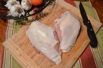 Bone-in, Skin-on Chicken Breasts ($8.49/lb.)